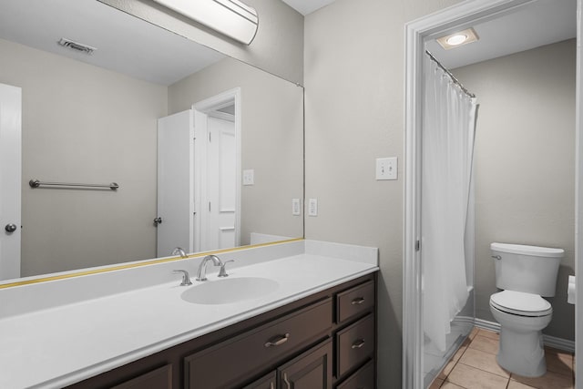 full bathroom with visible vents, toilet, a shower with shower curtain, tile patterned floors, and vanity