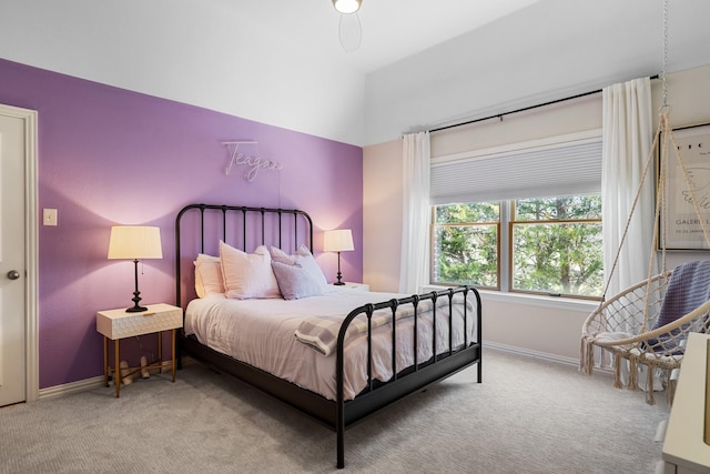 carpeted bedroom with baseboards