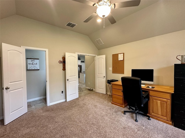 office space featuring visible vents, light colored carpet, ceiling fan, and vaulted ceiling