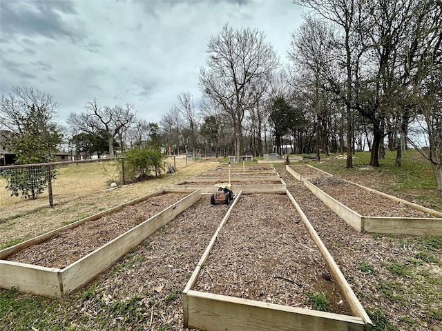 view of yard featuring a garden and fence