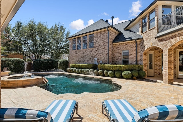 view of swimming pool with a fenced in pool and a patio