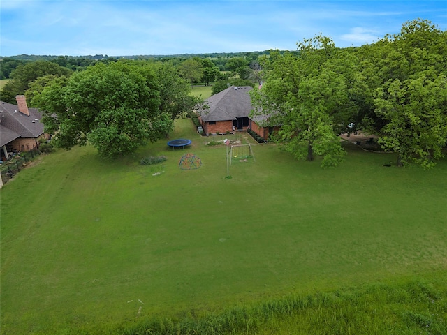 bird's eye view with a view of trees