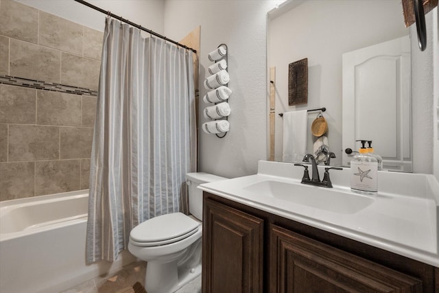 bathroom featuring vanity, toilet, and shower / bath combo with shower curtain