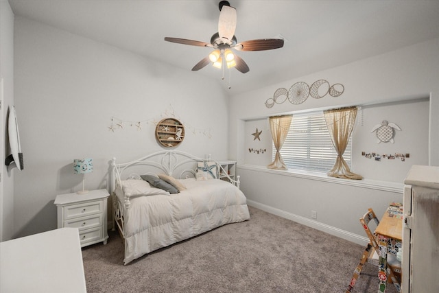 bedroom featuring lofted ceiling, carpet flooring, a ceiling fan, and baseboards