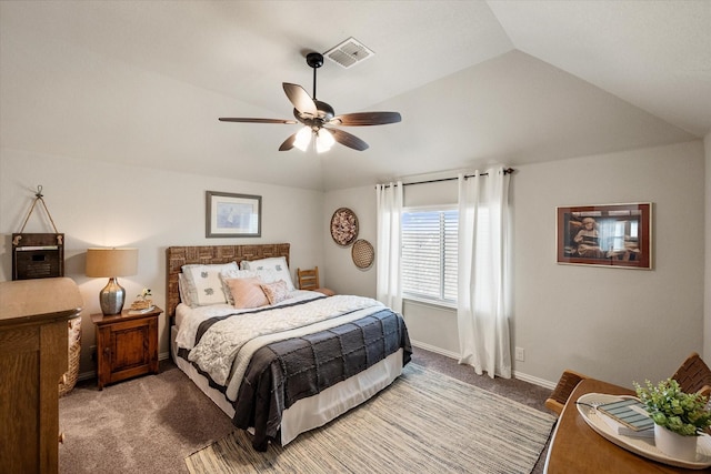 carpeted bedroom with lofted ceiling, baseboards, visible vents, and ceiling fan