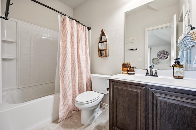 bathroom featuring tile patterned floors, toilet, shower / bath combo, and vanity