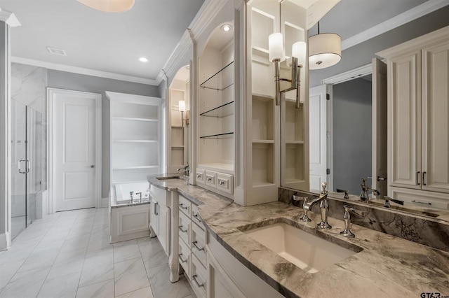 full bath with crown molding, a bath, marble finish floor, and a sink