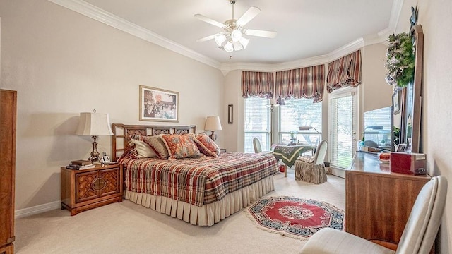 bedroom with access to exterior, baseboards, light colored carpet, ornamental molding, and a ceiling fan