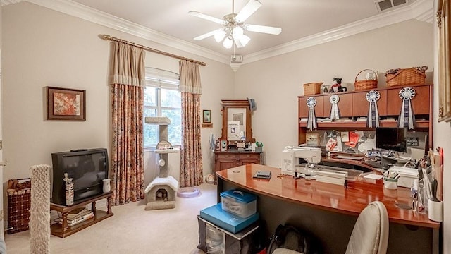 office area featuring carpet flooring, visible vents, crown molding, and a ceiling fan