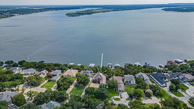 bird's eye view with a residential view and a water view