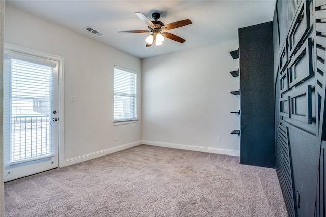 814 Davids Way, Allen, TX 75013 - unfurnished room featuring baseboards, a ceiling fan, visible vents, and light carpet