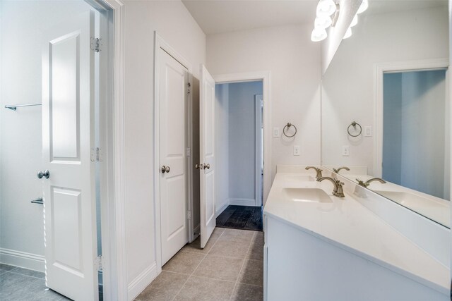 814 Davids Way, Allen, TX 75013 - full bath with tile patterned flooring, double vanity, baseboards, and a sink