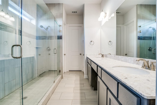814 Davids Way, Allen, TX 75013 - full bath with a sink, visible vents, a stall shower, and double vanity