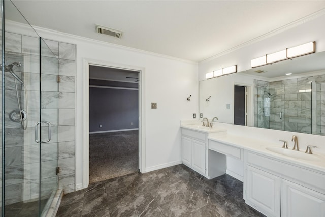 bathroom with visible vents, ornamental molding, a stall shower, and a sink