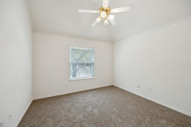 carpeted empty room with baseboards, crown molding, a ceiling fan, and vaulted ceiling