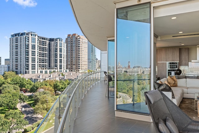 balcony featuring a view of city