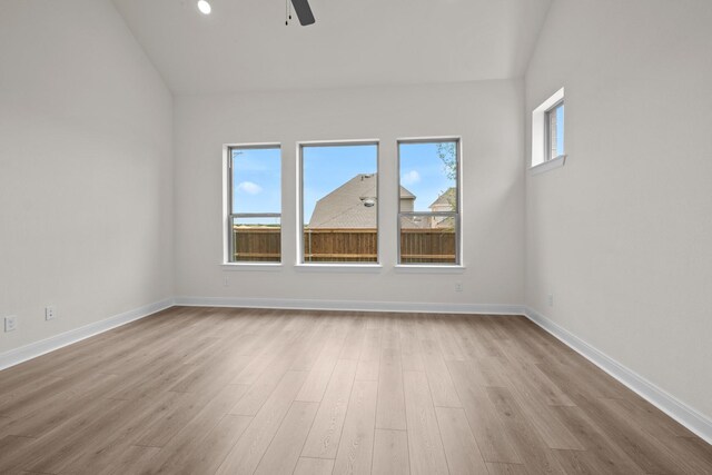 3100 Colt Ln, Celina, TX 75009 - unfurnished room featuring wood finished floors, a ceiling fan, baseboards, and vaulted ceiling