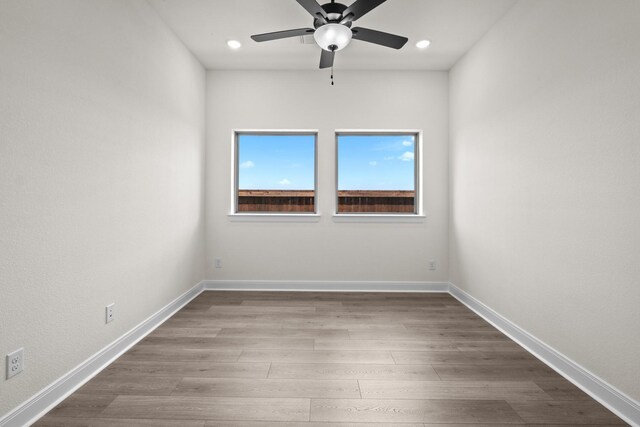 3100 Colt Ln, Celina, TX 75009 - spare room featuring wood finished floors, ceiling fan, recessed lighting, and baseboards