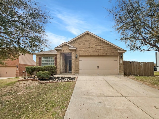 ranch-style house with brick siding, concrete driveway, an attached garage, and fence