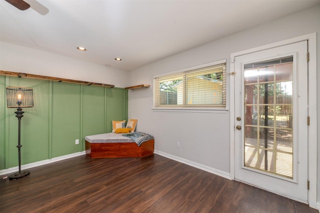 sitting room with recessed lighting, baseboards, and wood finished floors