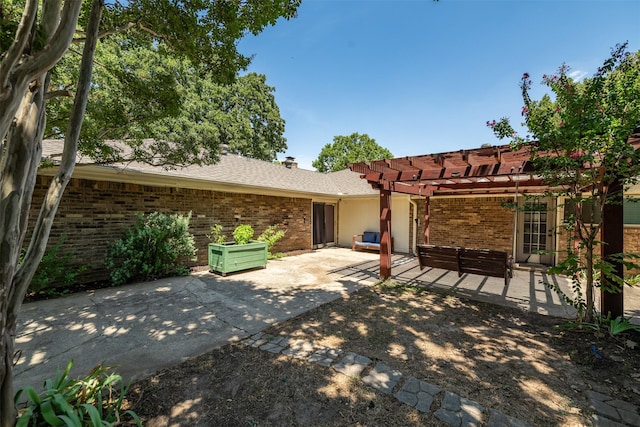 exterior space with a pergola