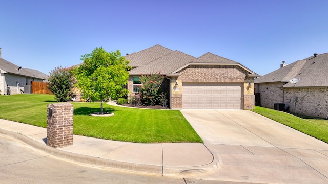 view of front of property with a front yard, driveway, roof with shingles, a garage, and brick siding