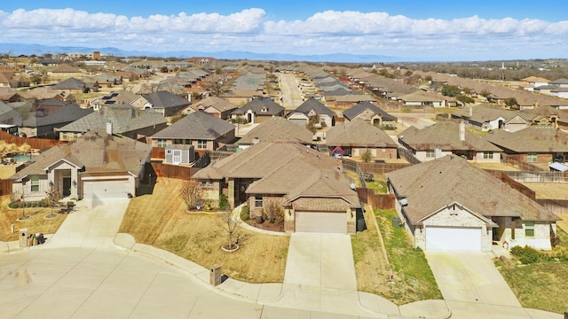 birds eye view of property with a residential view