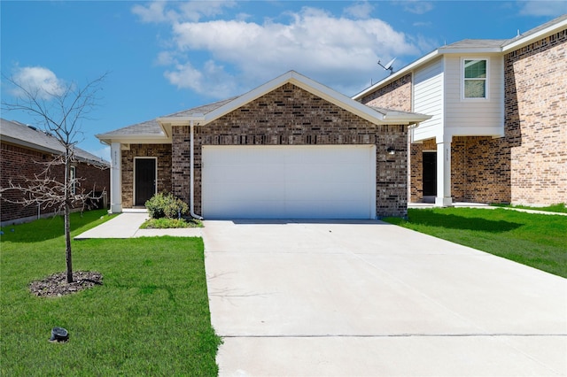 view of front of home featuring brick siding, an attached garage, driveway, and a front yard