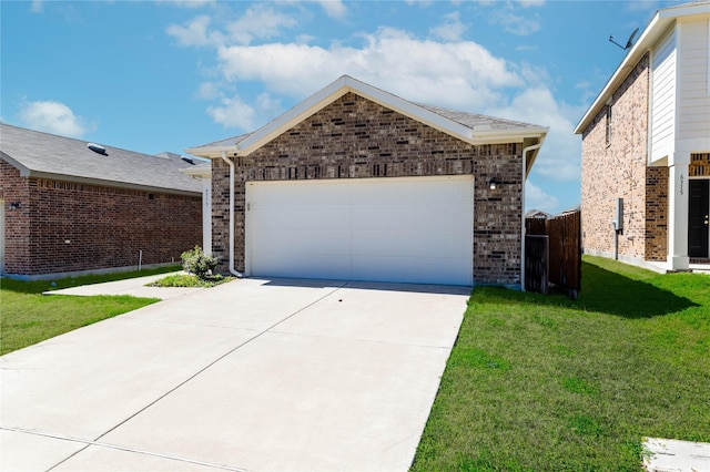 ranch-style home featuring driveway, a front yard, brick siding, and an attached garage