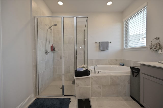 full bathroom with tile patterned floors, a garden tub, a stall shower, recessed lighting, and vanity