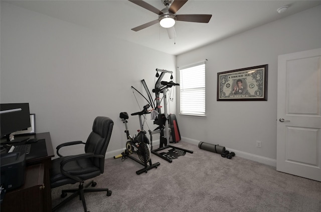 workout room with carpet flooring, ceiling fan, and baseboards