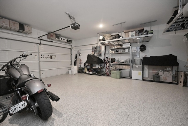 garage featuring a garage door opener