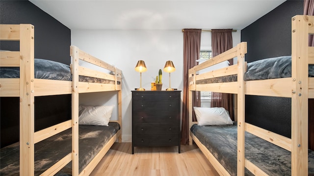 bedroom featuring wood finished floors