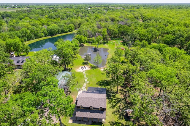 aerial view with a view of trees and a water view