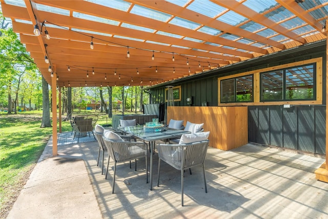 view of patio featuring outdoor dining area