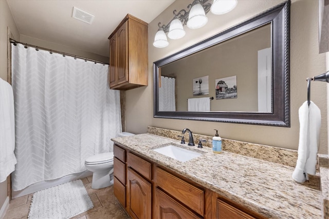 full bath with tile patterned floors, visible vents, toilet, and vanity