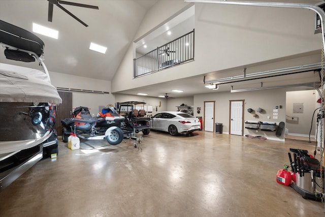 garage with electric panel and ceiling fan