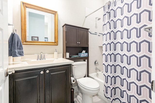 bathroom with toilet, vanity, and shower / tub combo