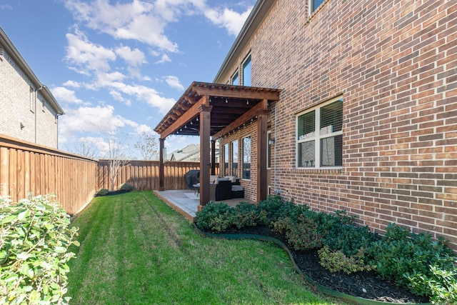 view of yard featuring a patio and a fenced backyard