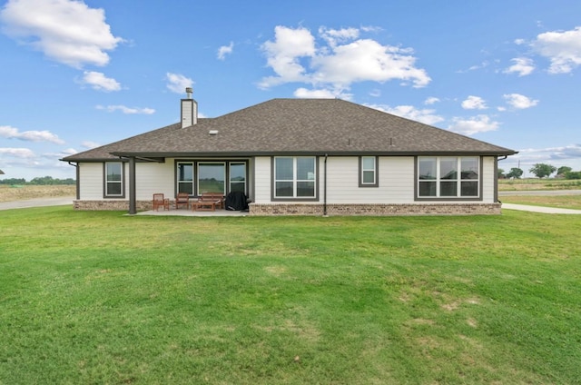 113 Misty Mountain Ln, Rhome, TX 76078 - rear view of property with a chimney, a yard, a patio, and brick siding