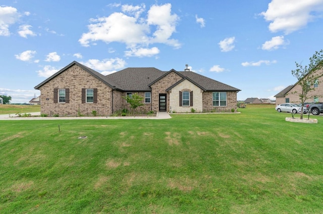 113 Misty Mountain Ln, Rhome, TX 76078 - view of front of property with a front yard and brick siding