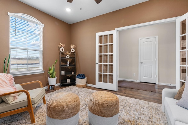 sitting room featuring baseboards, recessed lighting, french doors, wood finished floors, and a ceiling fan