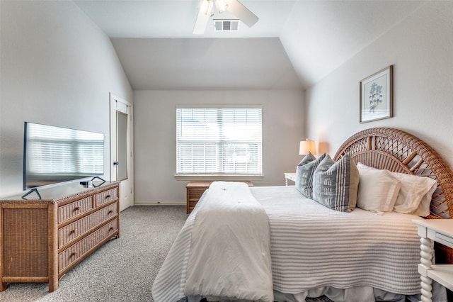 bedroom with visible vents, a ceiling fan, carpet floors, baseboards, and vaulted ceiling