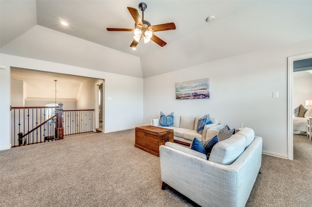 carpeted living area with vaulted ceiling, recessed lighting, baseboards, and ceiling fan