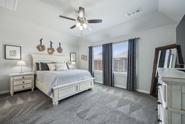 carpeted bedroom featuring visible vents, baseboards, and ceiling fan