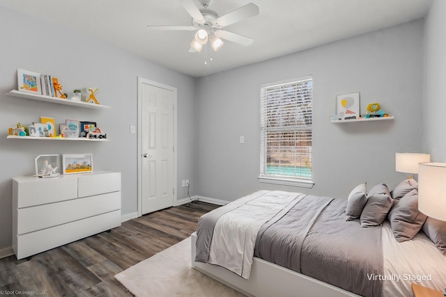 bedroom featuring a ceiling fan, dark wood-style floors, and baseboards