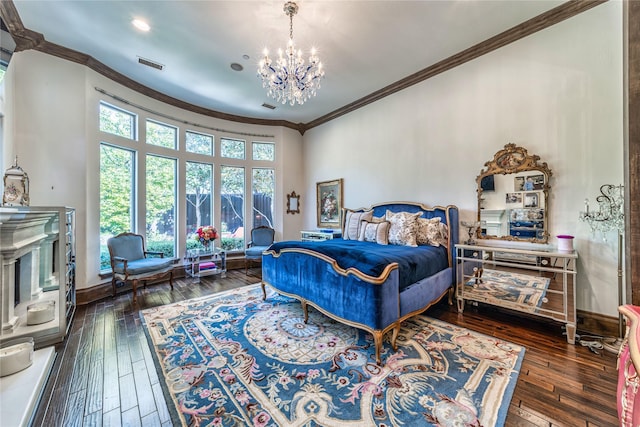 bedroom featuring baseboards, visible vents, and wood-type flooring