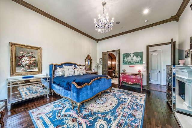 bedroom featuring wood-type flooring, an inviting chandelier, and crown molding