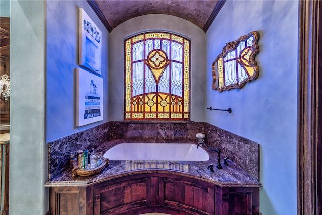 bedroom with a notable chandelier, crown molding, and hardwood / wood-style floors