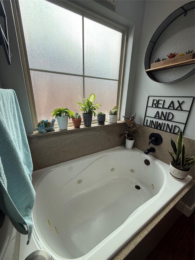 bathroom featuring a jetted tub